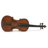 Old wooden violin with scrolled neck, the violin back 14 inches in length