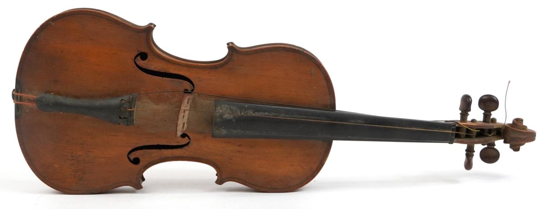 Old wooden violin with scrolled neck, the violin back 14 inches in length