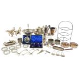 Silver plated items including swing handled basket, coasters, sugar sifter and pair of sauceboats