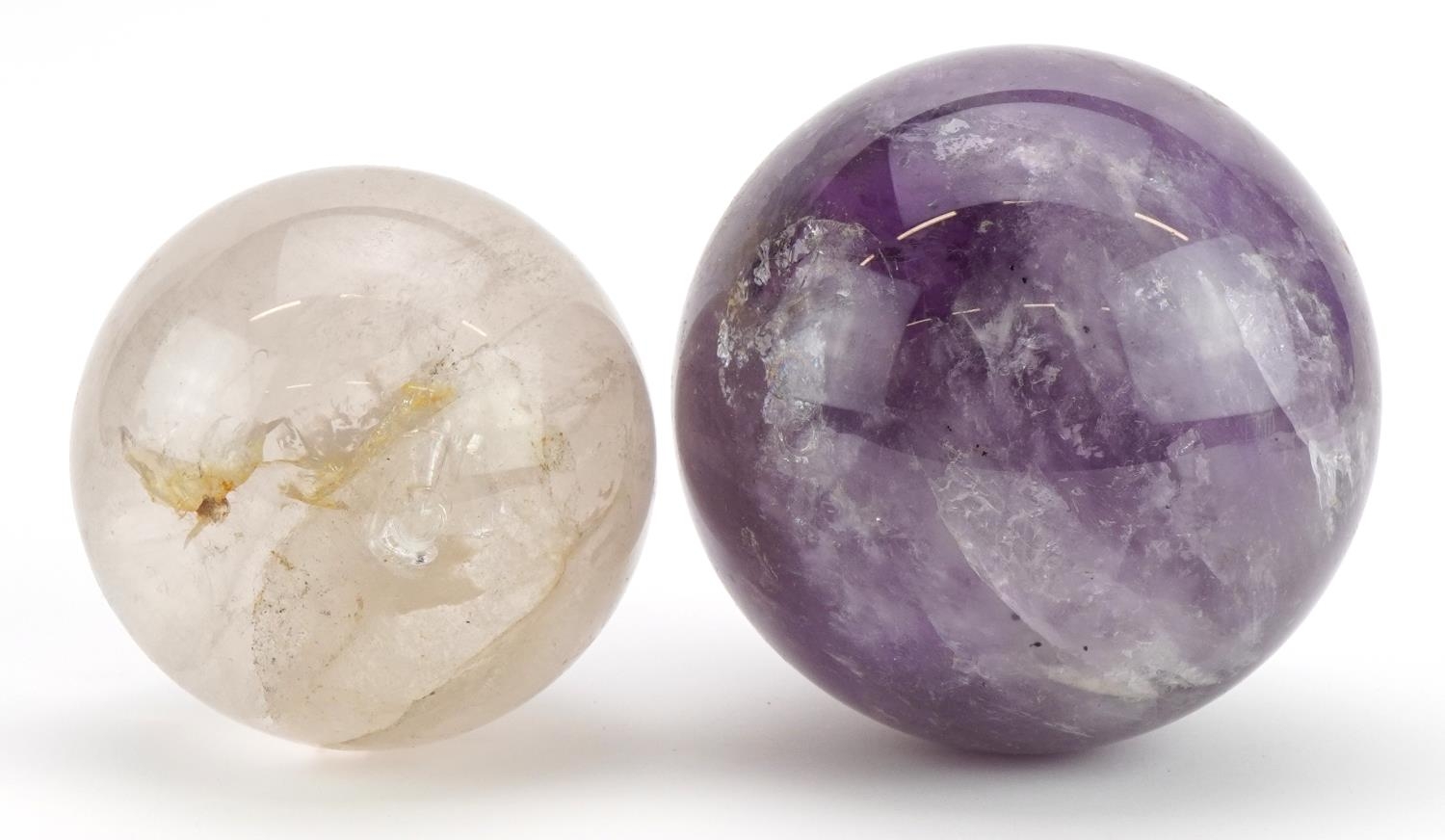 Two crystal balls including an amethyst example, the largest 11cm in diameter - Image 2 of 2