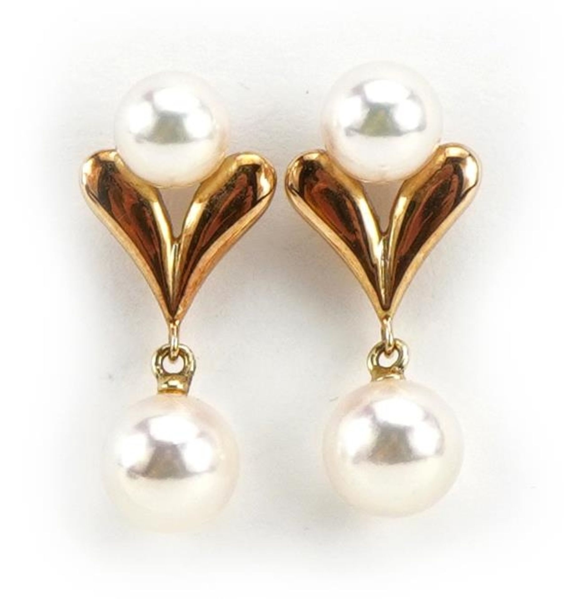 Pair of 14k gold Mikimoto pearl drop earrings housed in a Mikimoto Ginza, Tokyo box, 2.2cm high, 3.