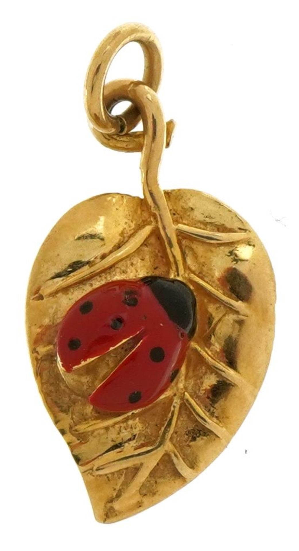 9ct gold and enamel ladybird on leaf charm, 1.9cm high, 1.3g