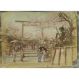 Collection of Japanese photographs arranged in an album including The Tomb of Kiyomori, opium