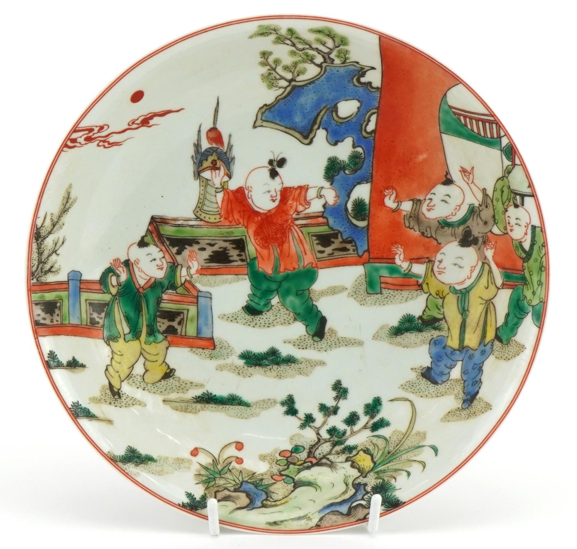 Chinese porcelain dish hand painted in the famille verte palette with children playing, six figure