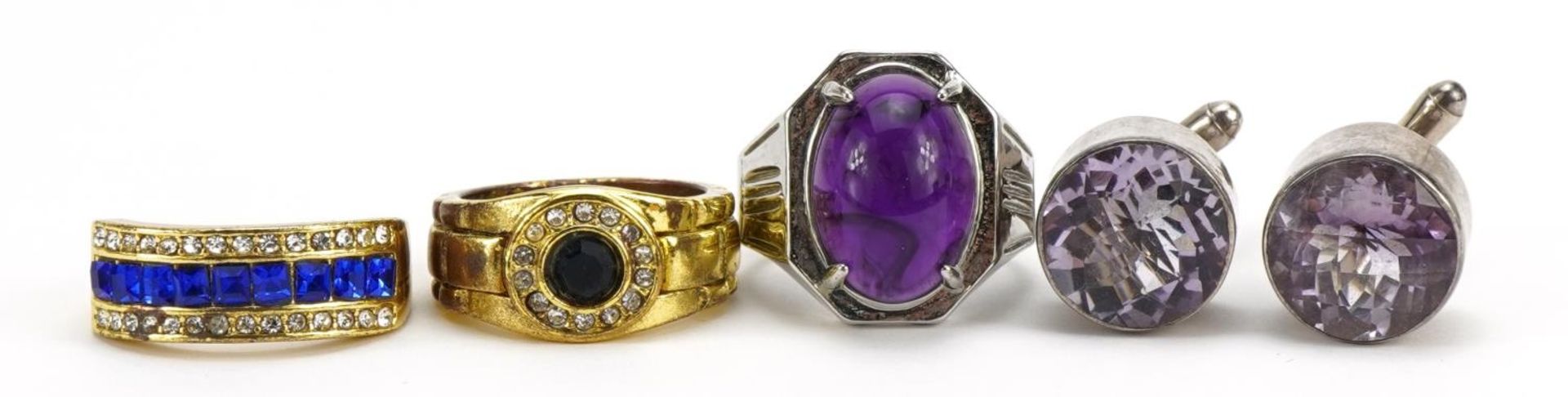 Pair of silver purple stone cufflinks and three dress rings