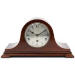 Mahogany Napoleon hat shaped Westminster chime mantle clock, the silvered dial with Arabic numerals,