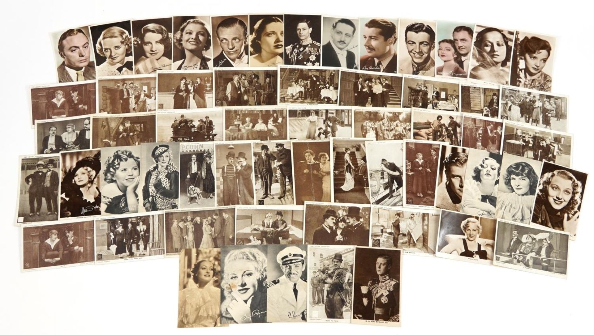 Collection of black and white postcards, mostly film stars and royalty