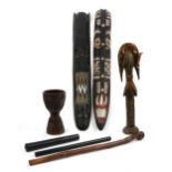 African and tribal carved wood items including two large hand painted wall masks and ebony