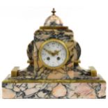 Art Deco marble and green onyx striking mantle clock, the enamelled dial having Arabic numerals,