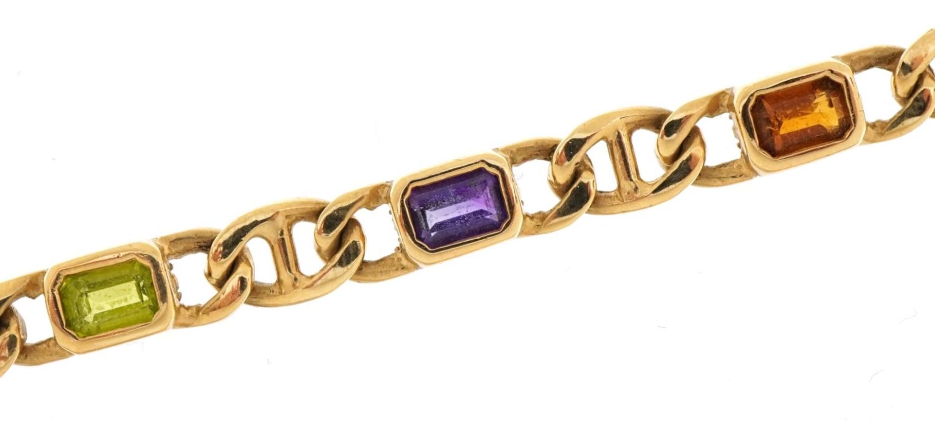 9ct gold curb link design bracelet set with purple, green and orange stones, 17.5cm in length, 12.4g