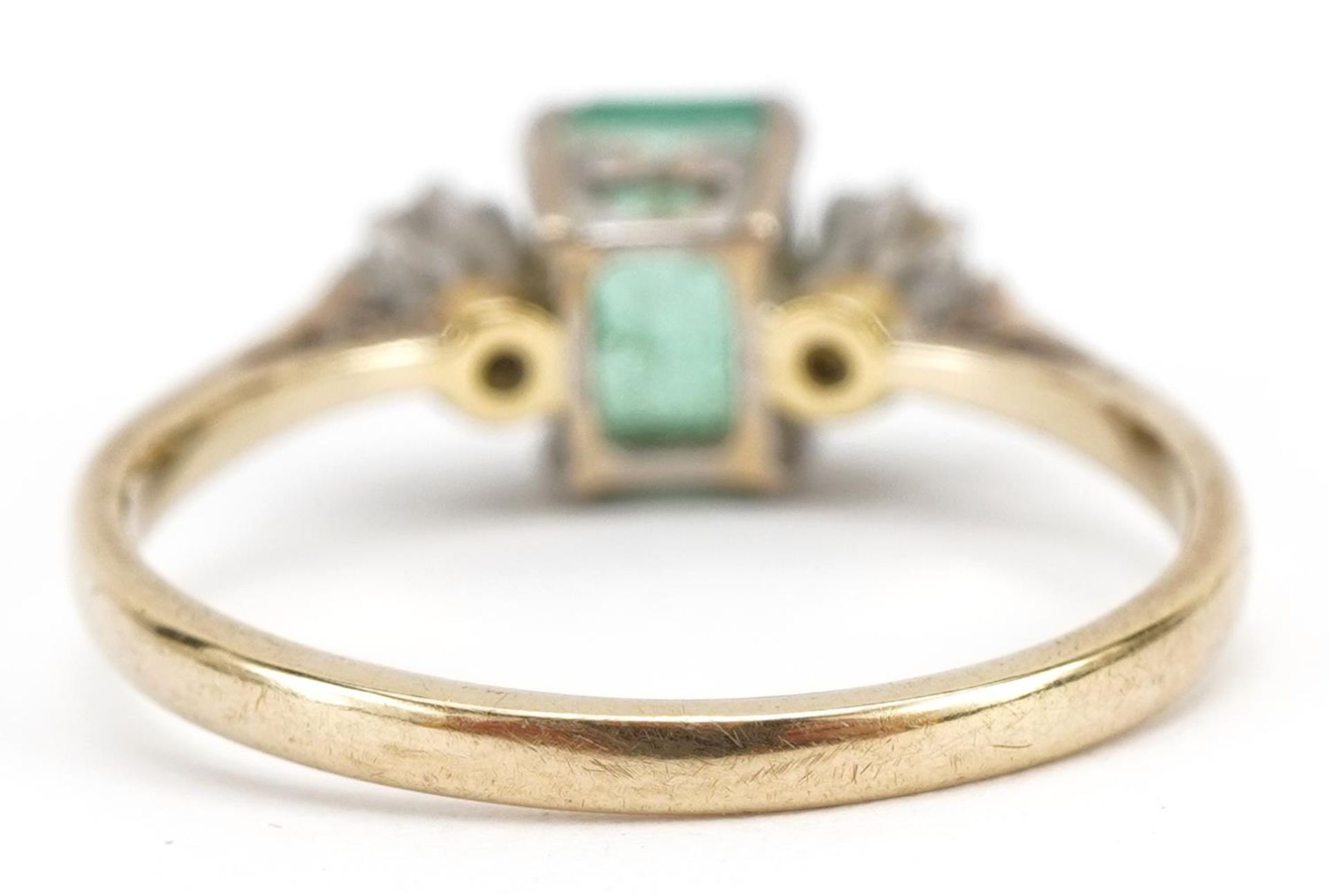 9ct gold emerald and diamond three stone ring, the emerald approximately 6.8mm x 4.8mm, each diamond - Image 2 of 4