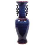 Chinese floor standing vase with twin handles having a flambe glaze, 120cm high