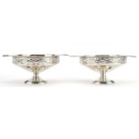 Pair of continental Arts & Crafts pierced silver pedestal bonbon dishes with twin handles, 5cm