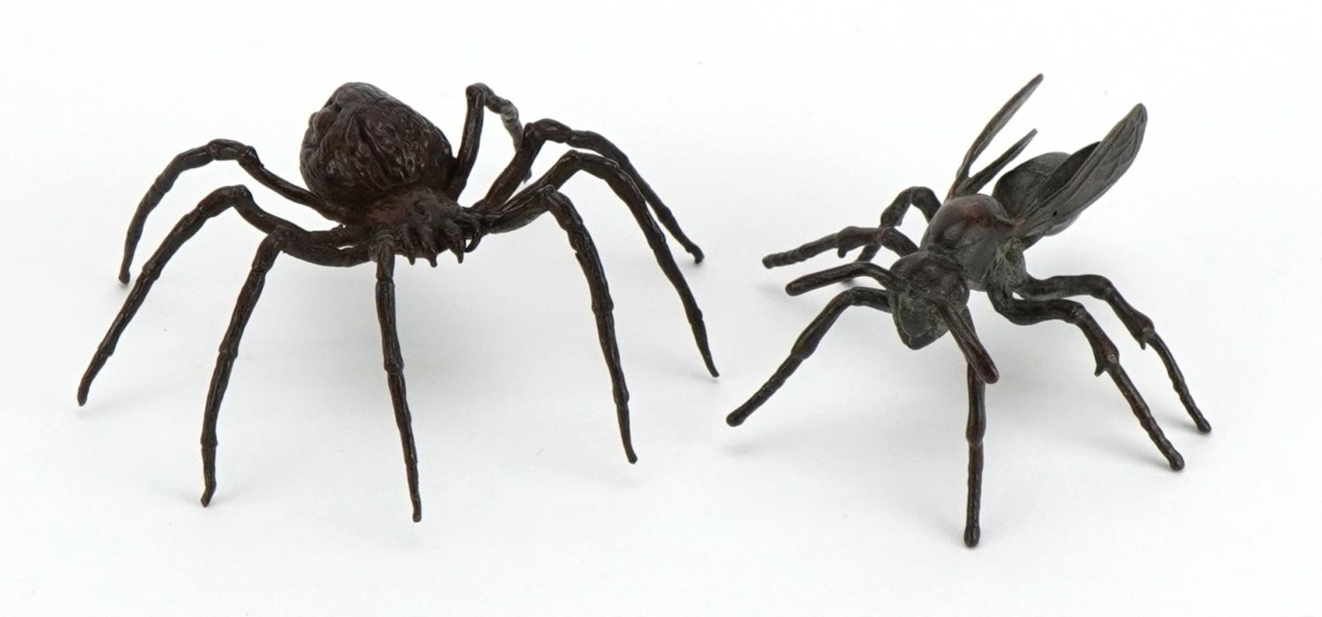 Two Japanese patinate bronze animals comprising wasp and spider, the largest 6.5cm wide