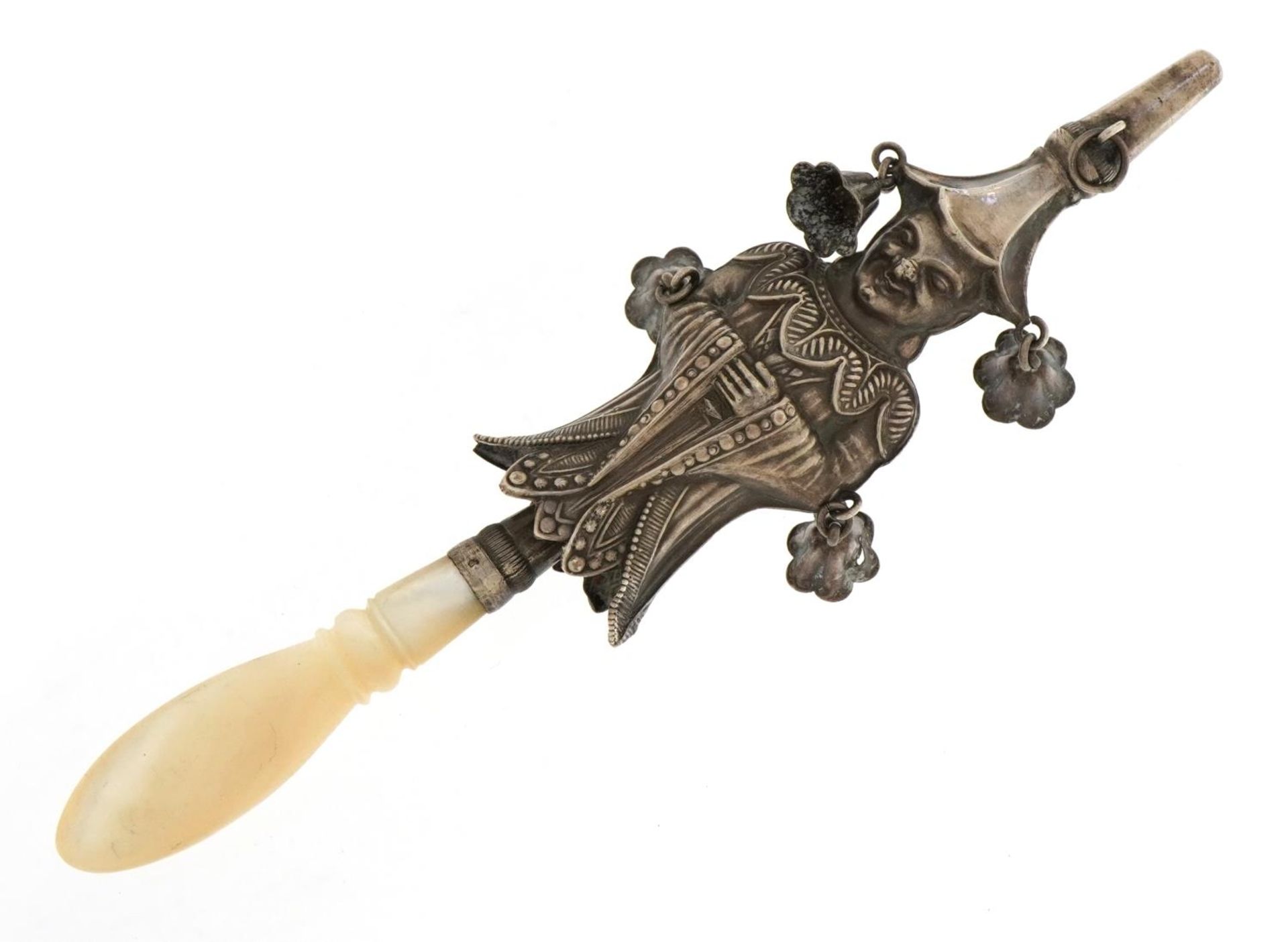 Silver baby's rattle with whistle and mother of pearl handle in the form of a gentleman in a robe,