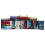 Assorted paperback novels including Simon Montefiore, Robert Wilson, Lucinda Riley and Kate