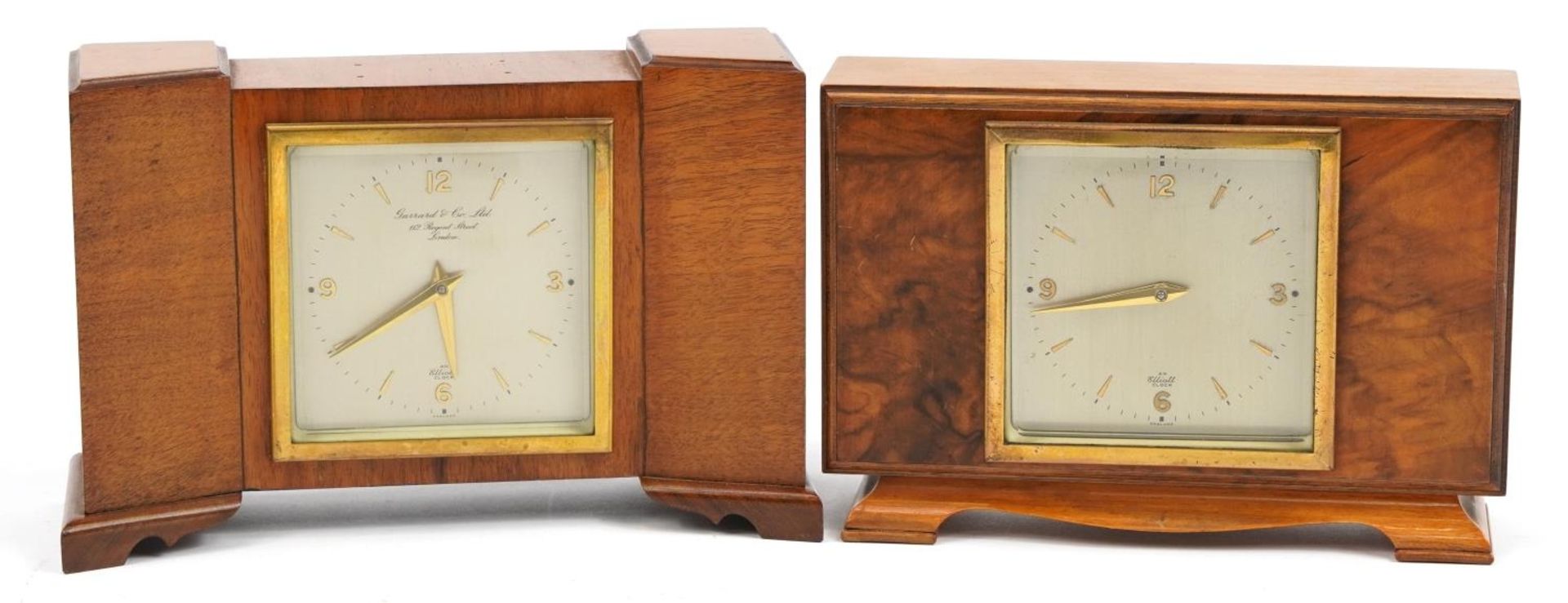 Two Art Deco Elliott walnut mantle clocks one retailed by Garrard & Co 12 Regent Street London,