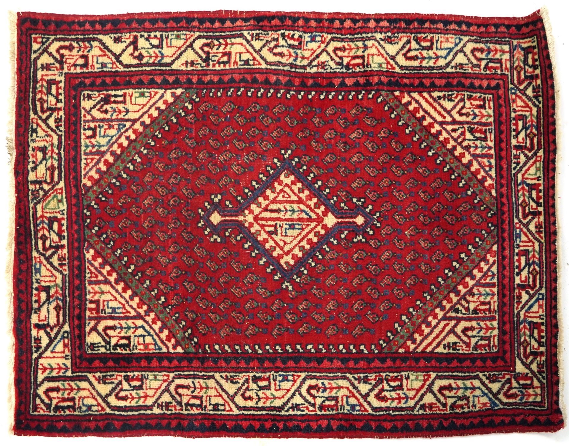 Rectangular Middle Eastern red ground rug, 155cm x 105cm