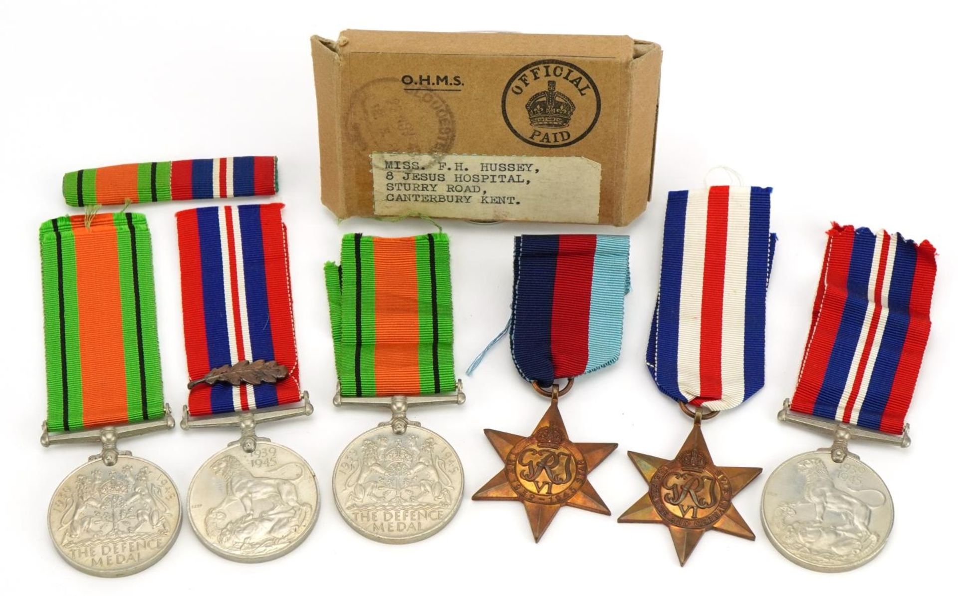 British military World War II medals including box of issue addressed to Miss F H Hussey