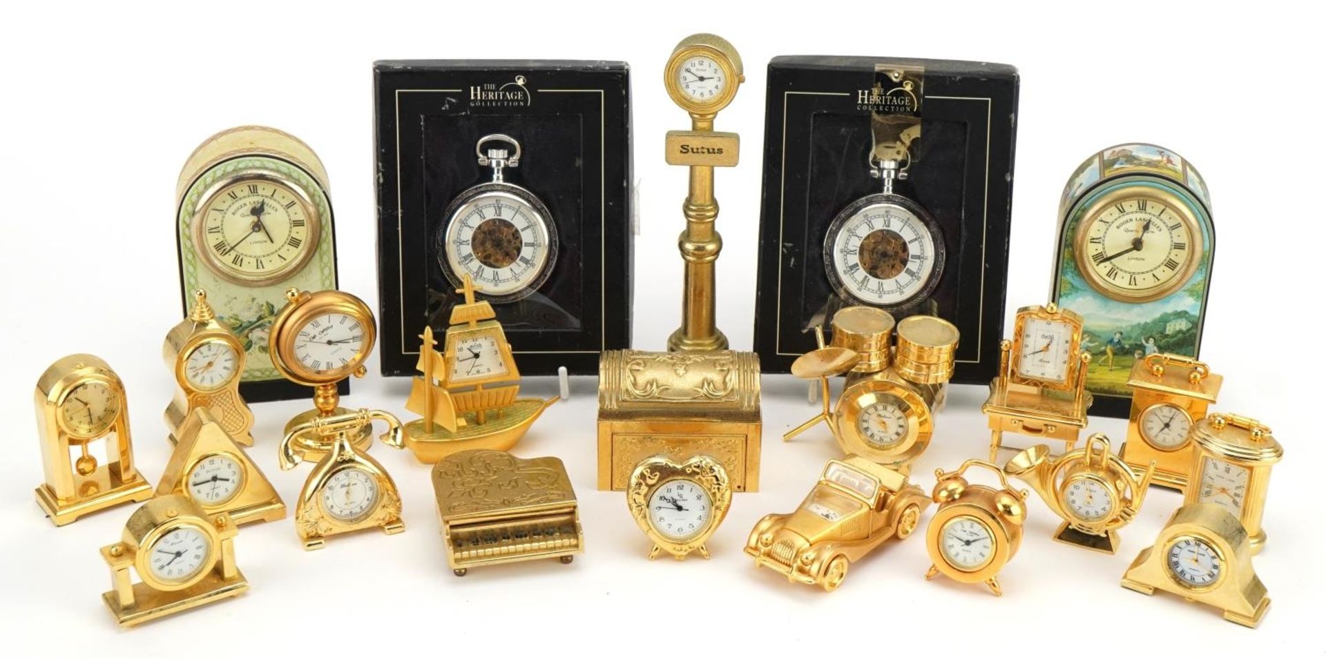 Collection of miniature novelty brass clocks and pocket watches including drum kit, piano and