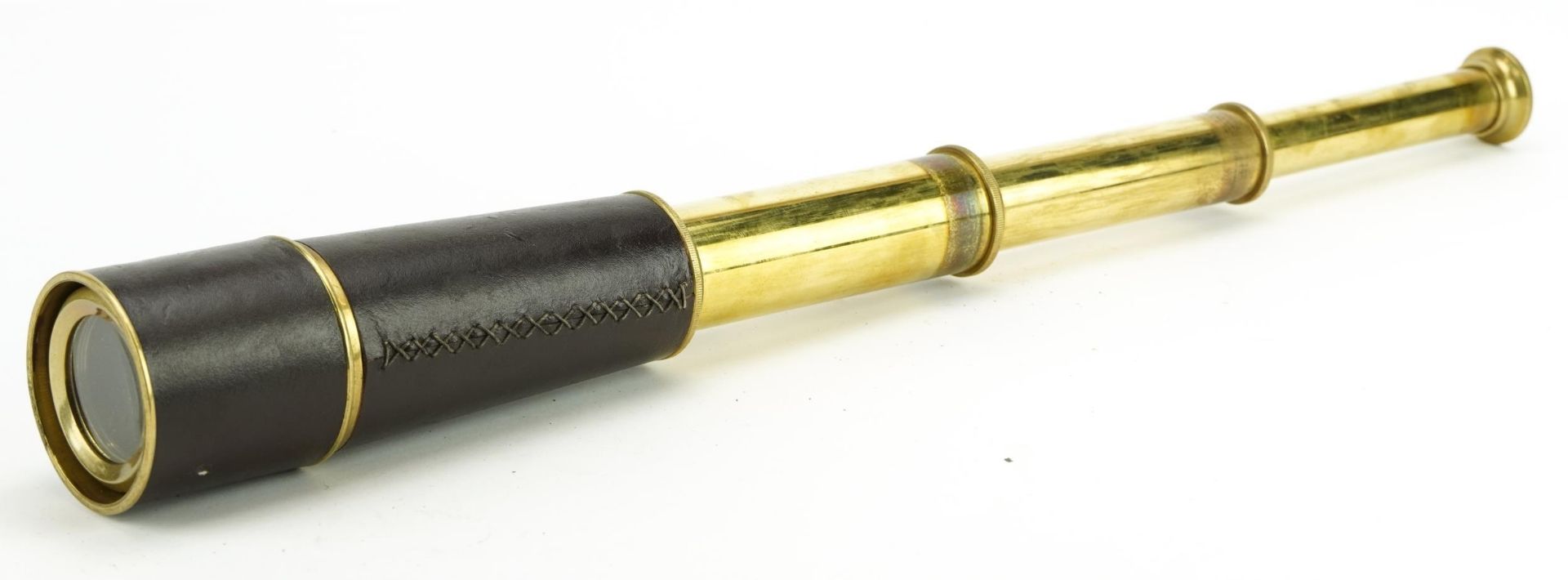 Naval interest leather bound brass three draw telescope, 46cm in length when extended