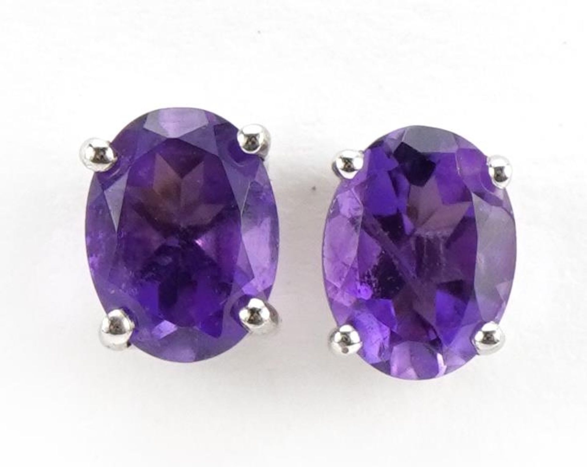 Pair of silver amethyst stud earrings, 8mm high, 1.5g