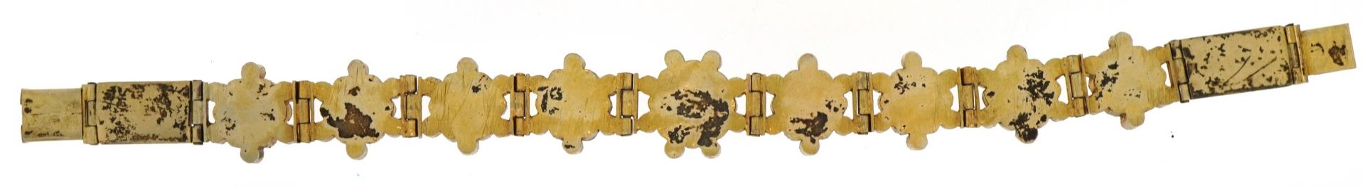 Continental gilt metal flower head multigem bracelet, set with colouful stones including rubies, - Image 3 of 3