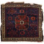 Afghan red and blue ground Belutch rug with all over geometric design, 86cm x 76cm