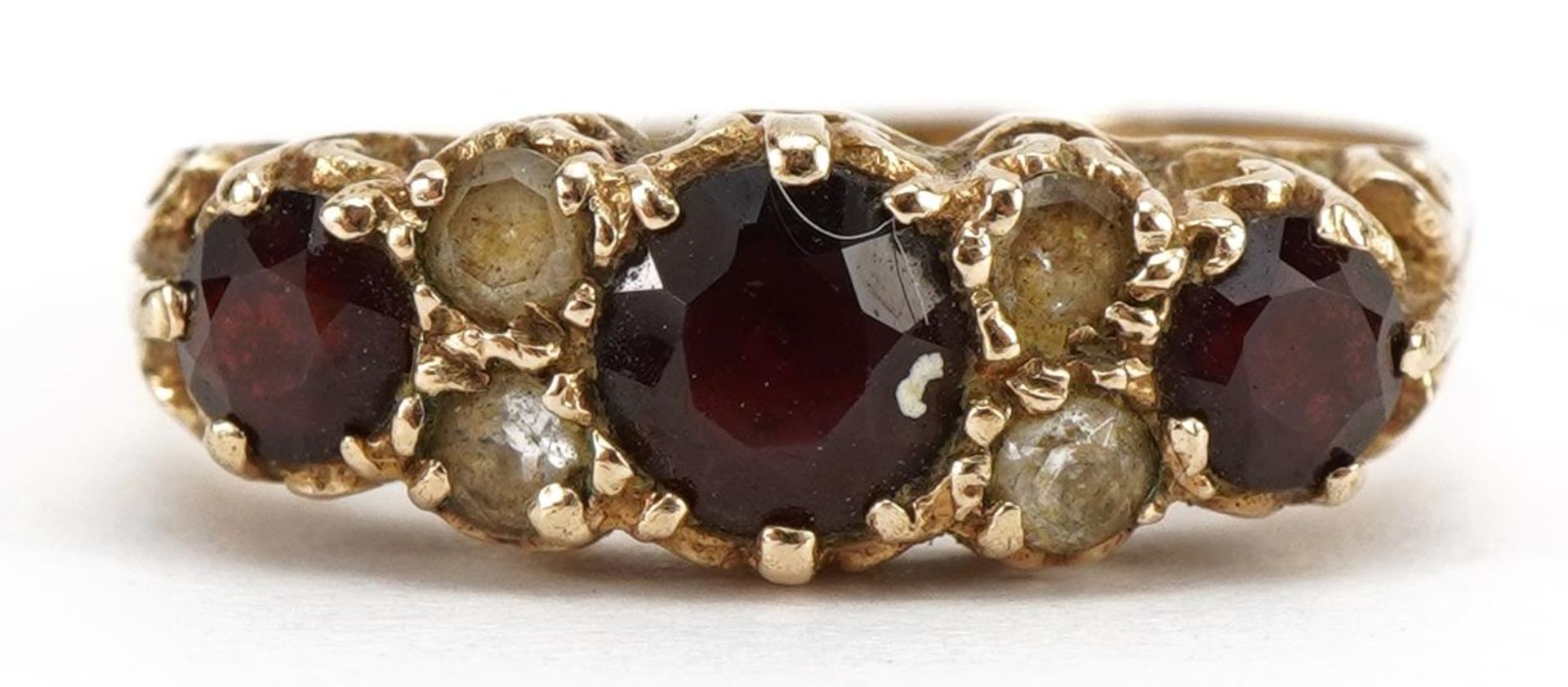 Victorian style 9ct gold garnet and clear stone ring, the central garnet approximately 5.0mm in