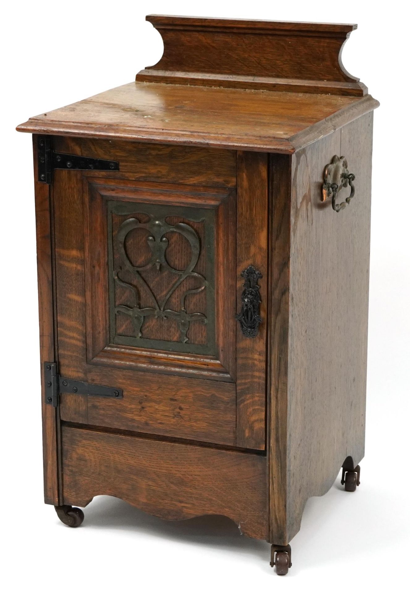 Arts & Crafts oak side cabinet with pierced copper plaque to the door, 68cm H x 38.5cm W x 36.5cm D