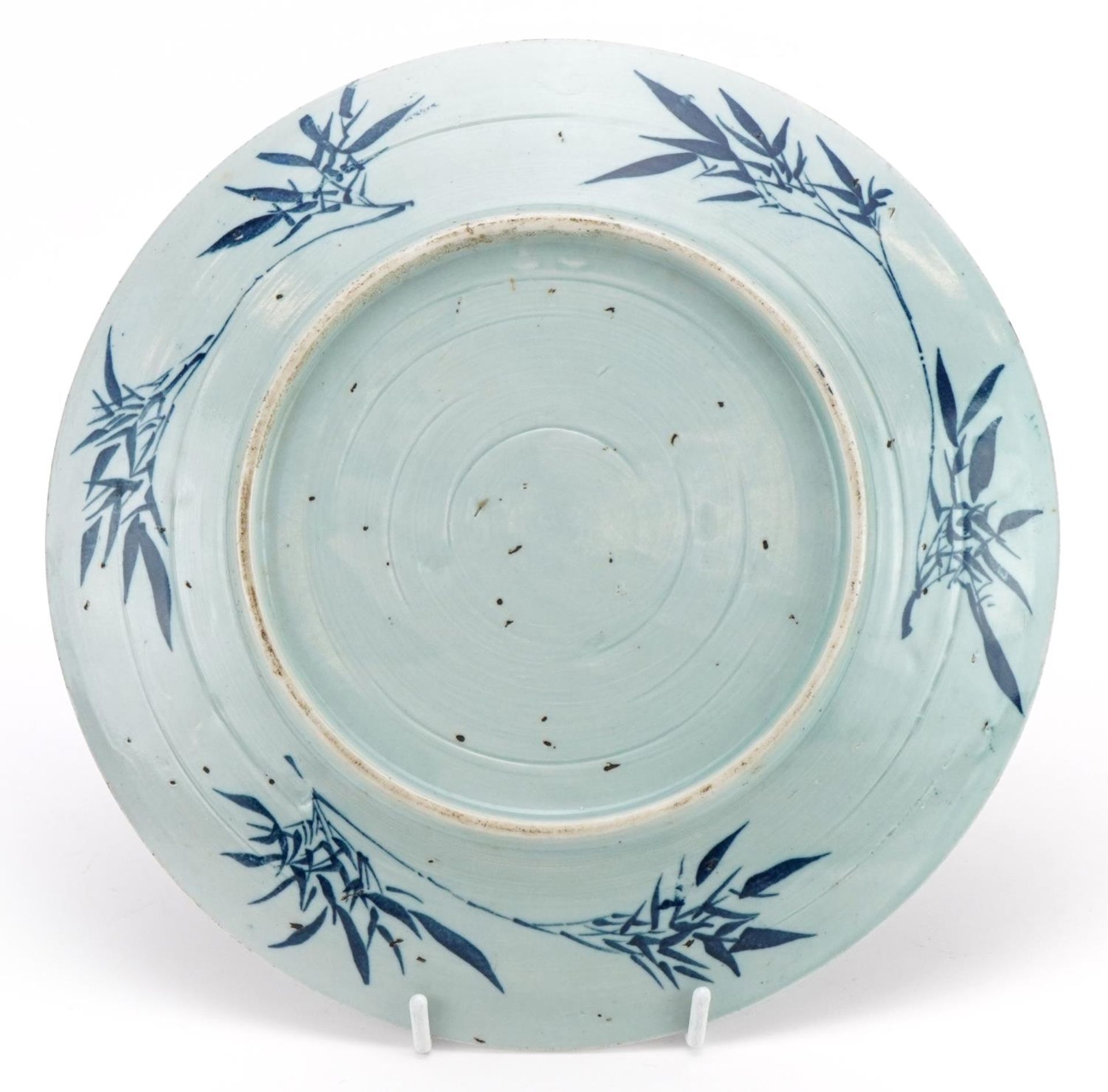 Chinese blue and white porcelain plate decorated with an emporer in a palace setting, 25.5cm in - Image 2 of 2