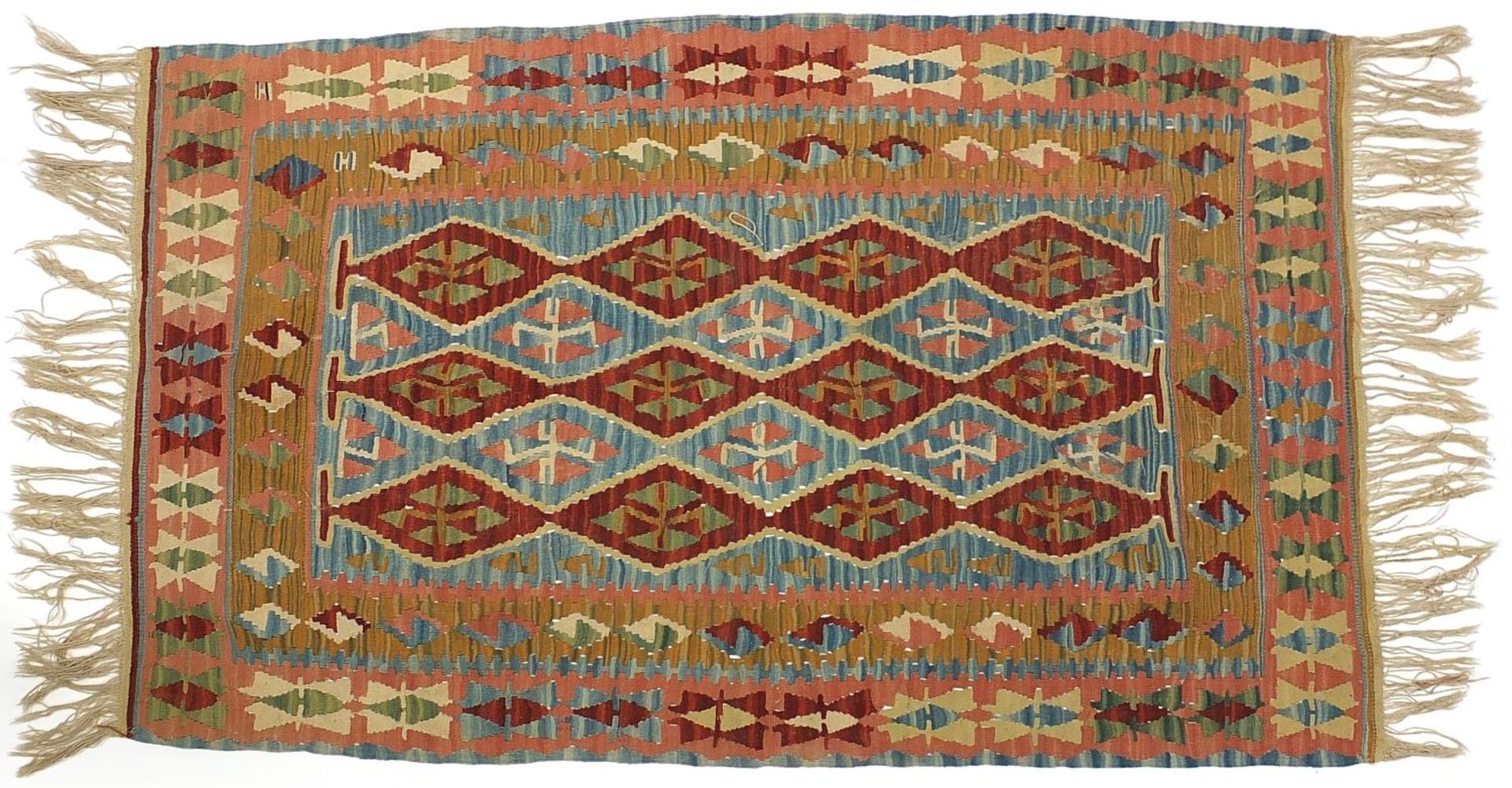 Rectangular Turkish Kilim rug having an all over geometric design, 190cm x 118cm