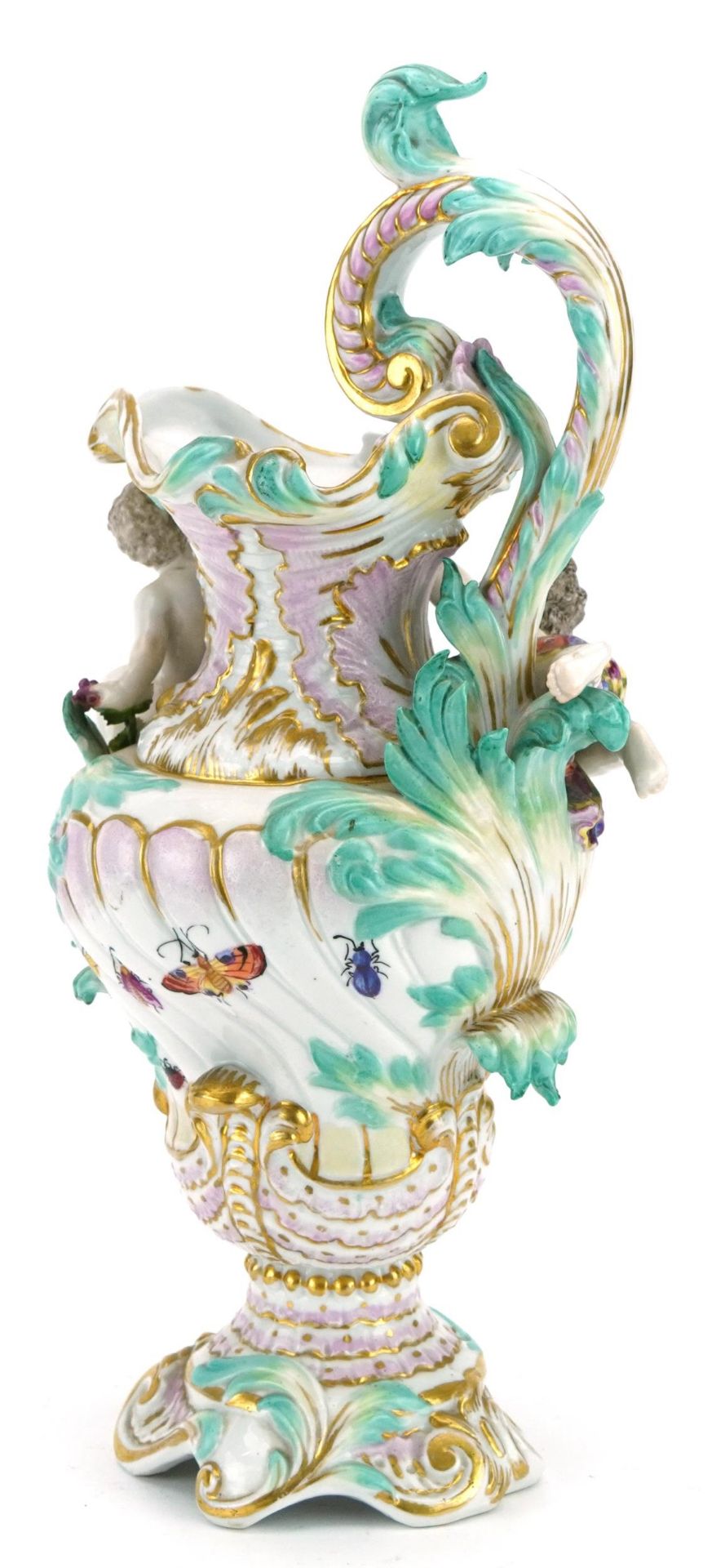 Manner of Dresden, continental porcelain floral encrusted ewer surmounted with two Putti, - Bild 2 aus 3