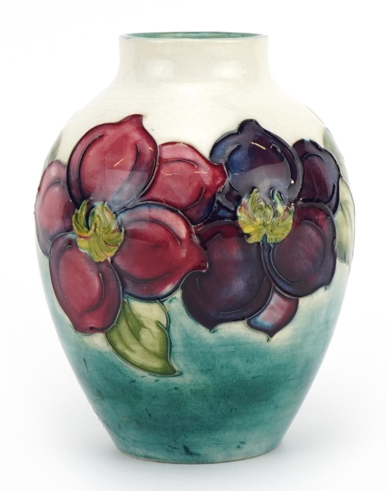 Moorcroft Pottery vase hand painted with flowers, 12.5cm high