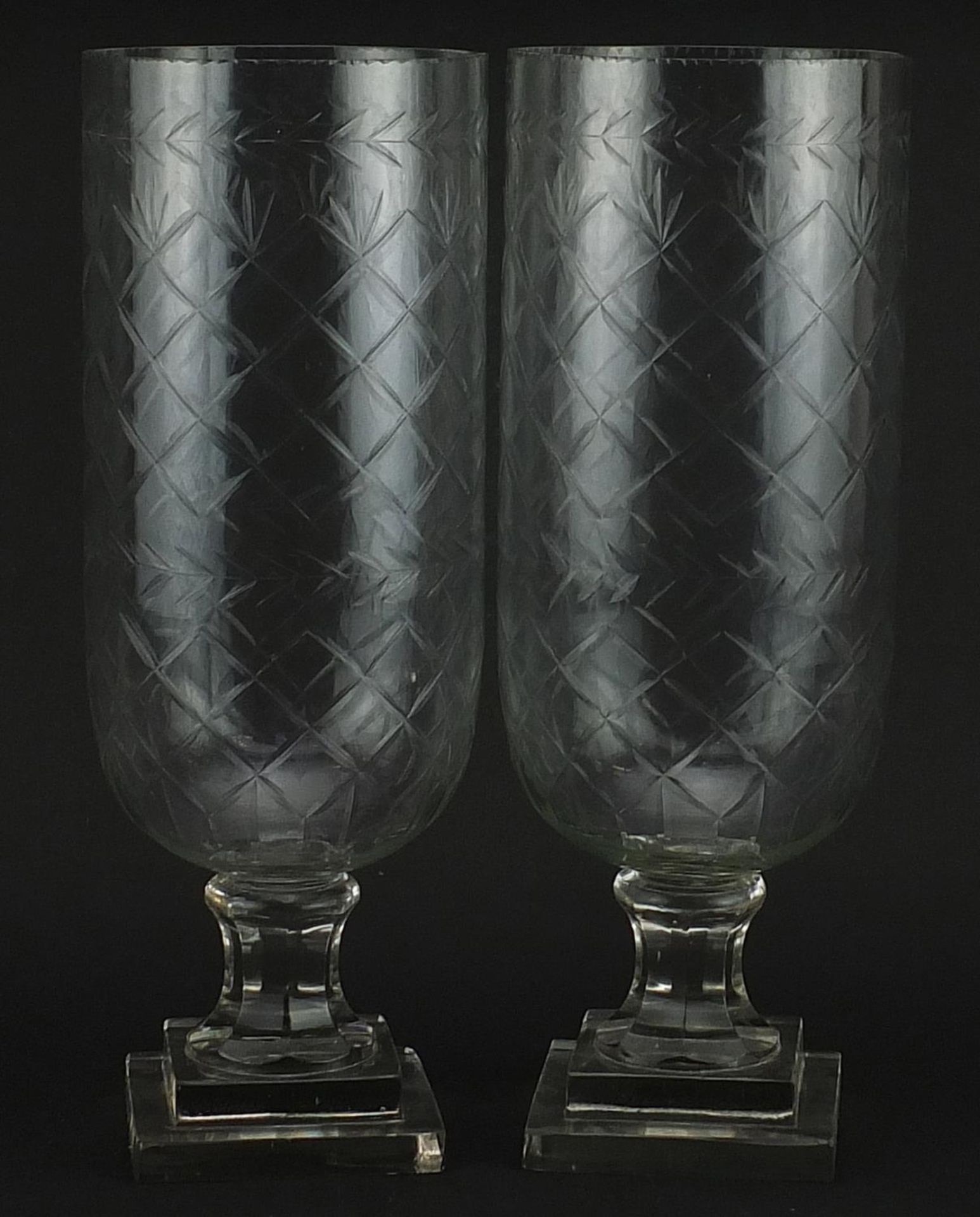 Pair of Regency style cut glass celery vases, each 40.5cm high