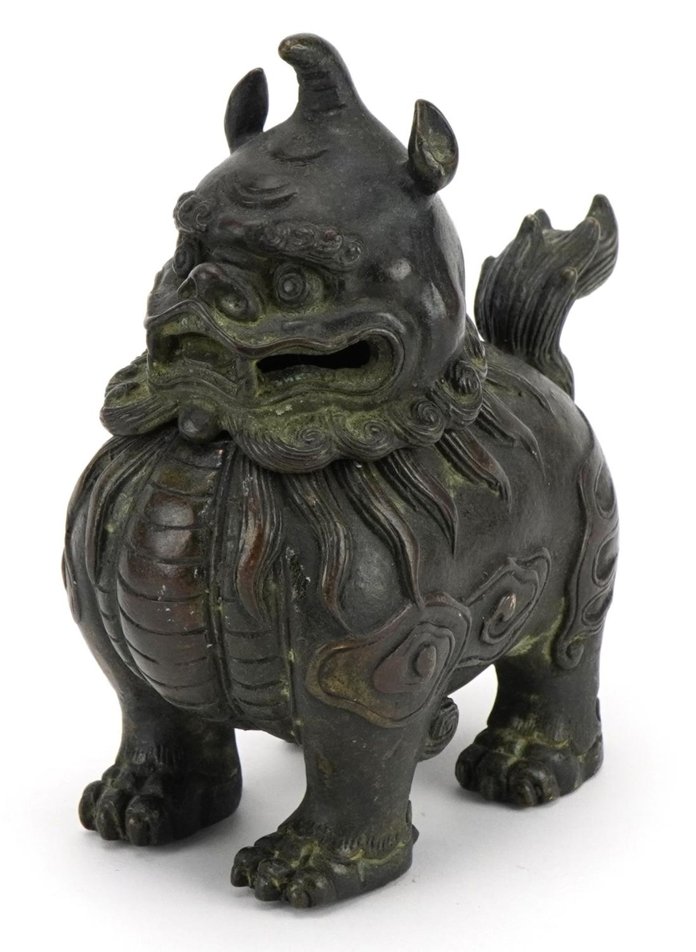 Chinese patinated bronze incense burner in the form of a Foo dog, impressed mark to the underside,