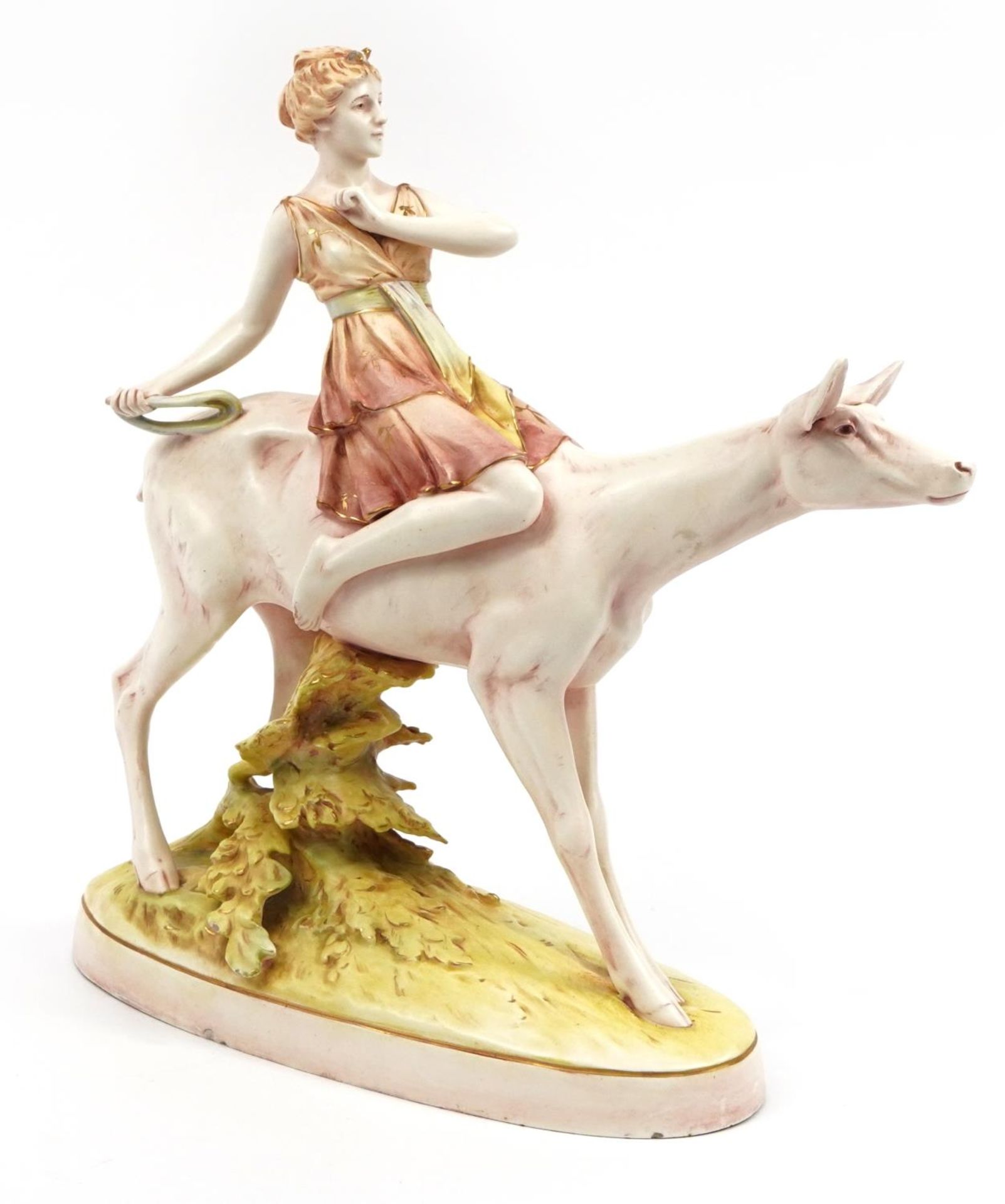 Royal Dux, Czechoslovakian Art Nouveau figure group of a Diana the huntress on deer, numbered 13289,