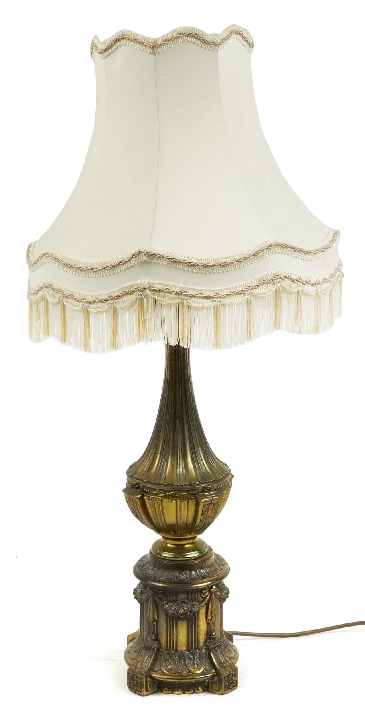Ornate gilt brass table lamp with shade, 77cm high
