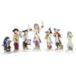Set of eight continental hand painted porcelain monkey band musicians, 15.5cm high