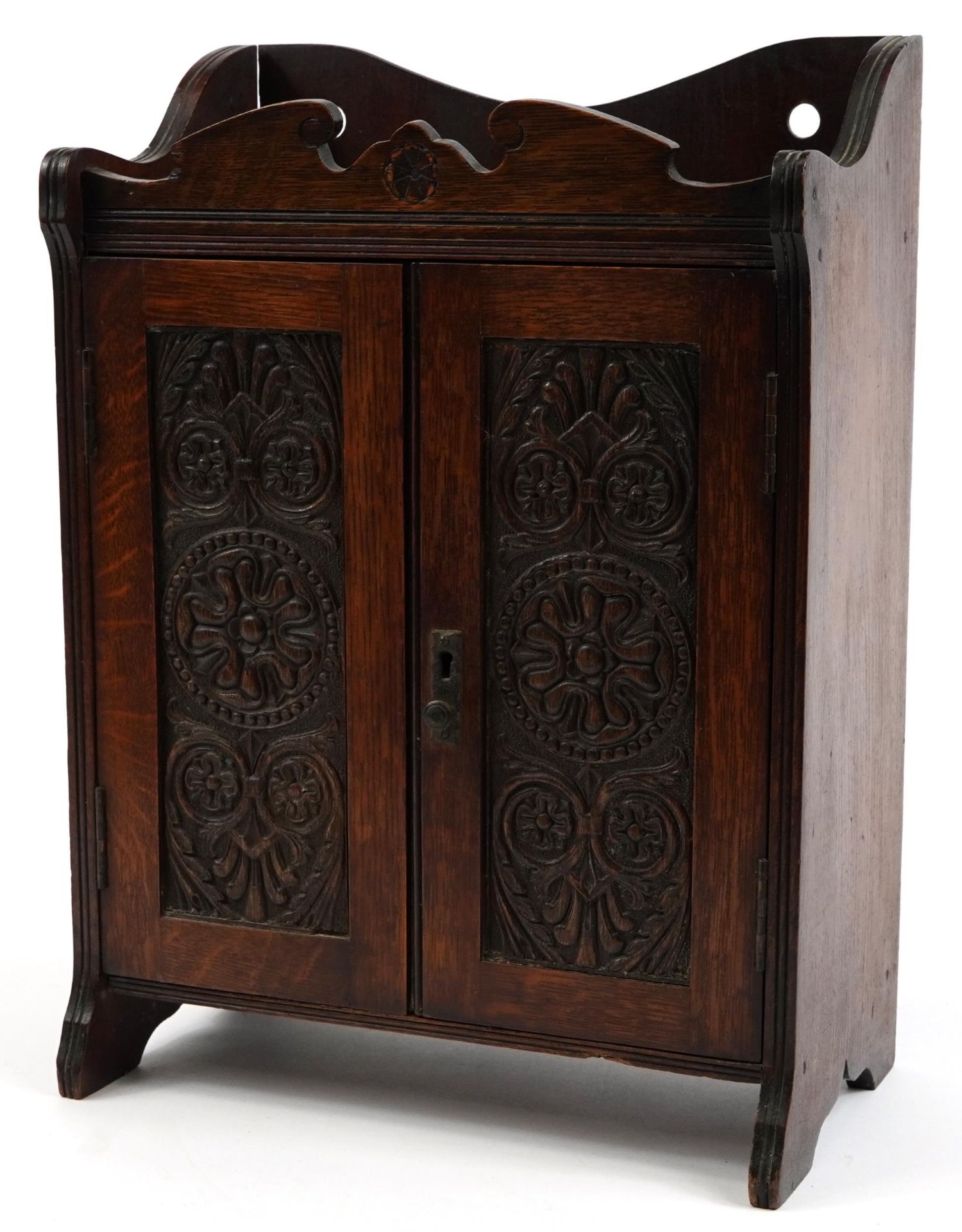 Arts & Crafts oak two door smokers cabinet with fitted interior, 45cm H x 32.5cm W x 18cm D