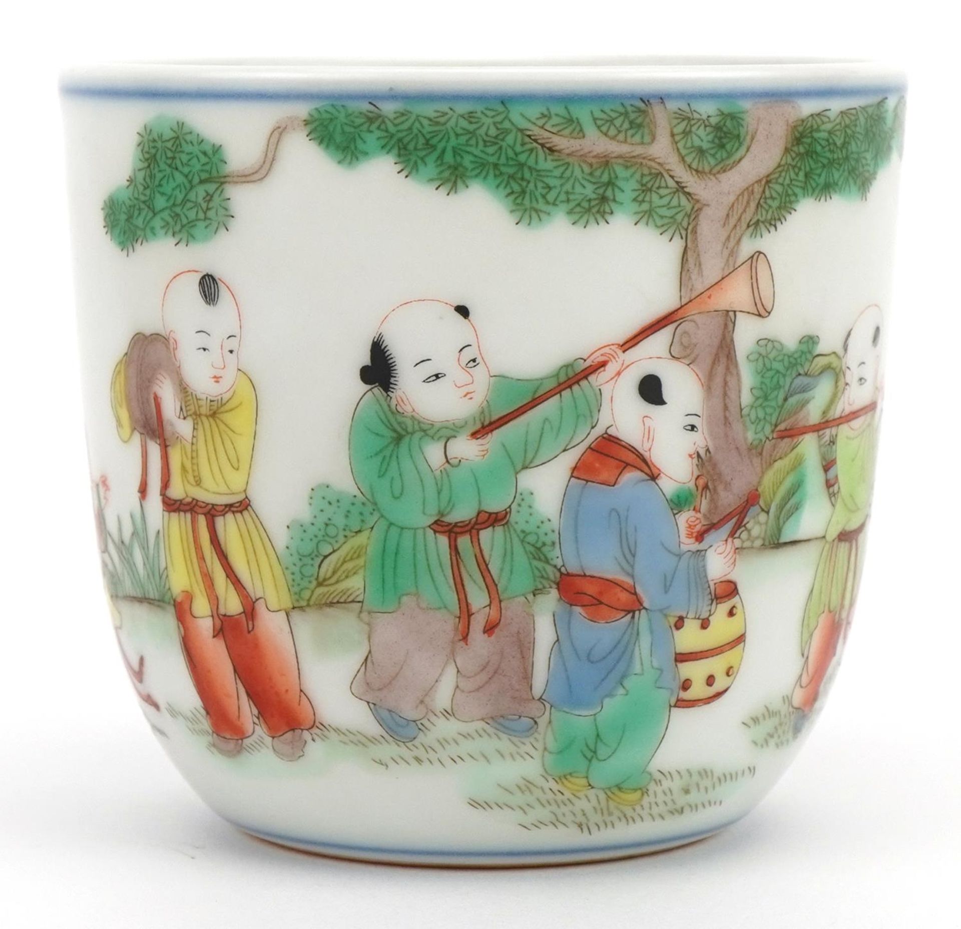 Chinese porcelain teacup hand painted in the famille verte palette with children playing