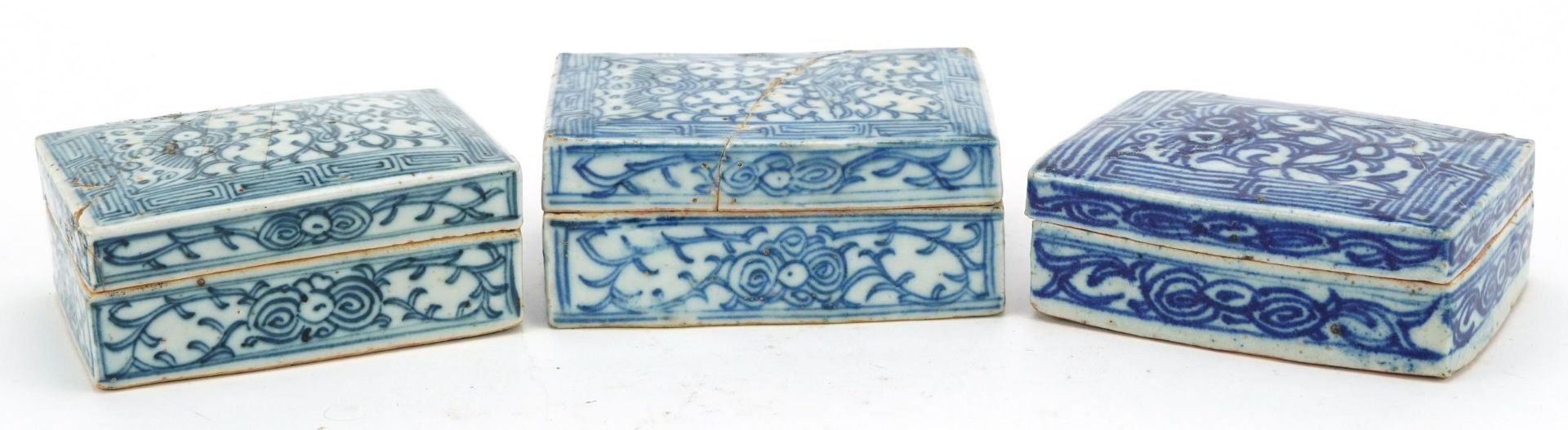 Three Chinese rouge sealed boxes and covers hand painted with flowers, two with incised character