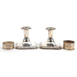 Pair of continental 813 grade silver square based dwarf candlesticks and two circular silver