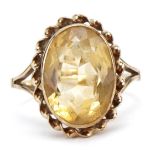 9ct gold citrine solitaire ring, the citrine approximately 12.8mm x 9.2mm, size M, 3.4g