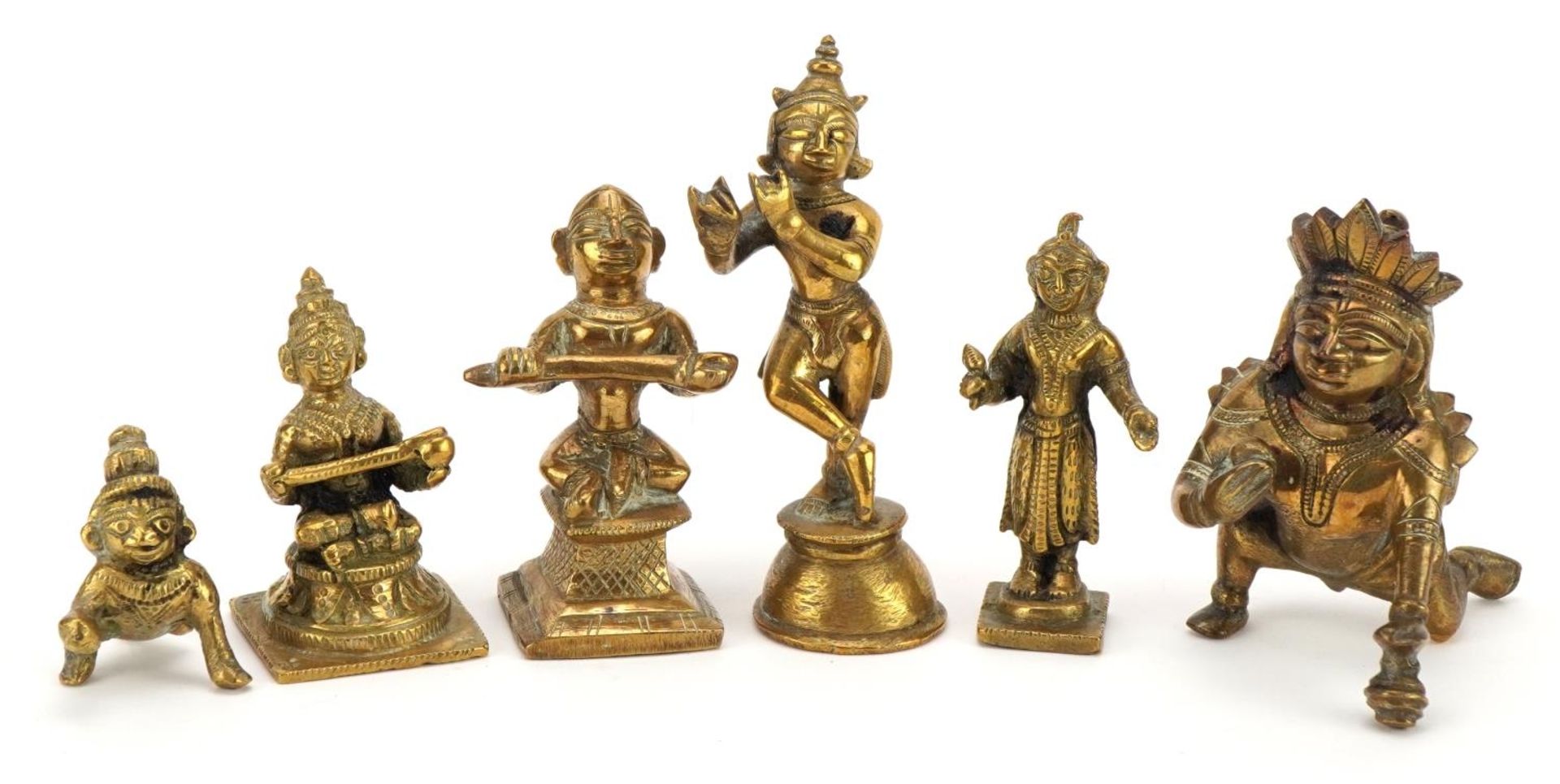 Six Indian bronze figures of Buddha and deities, the largest 9.5cm high