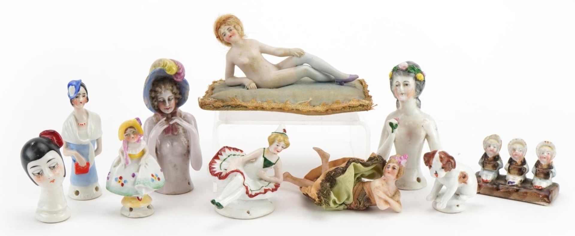 19th century and later porcelain including half pin dolls, the largest 11cm wide