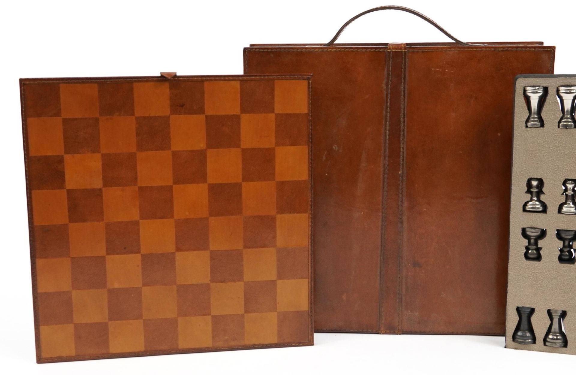 Tan leather cased travelling chess set with cast metal pieces, the largest piece 8cm high - Image 3 of 7