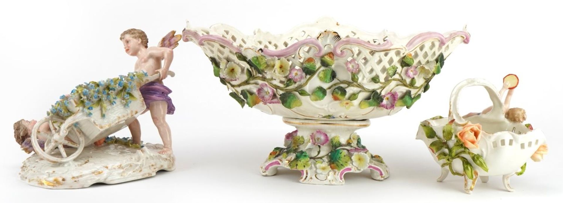 German floral encrusted porcelain including a centrepiece and four footed basket with Putti, the - Bild 4 aus 6