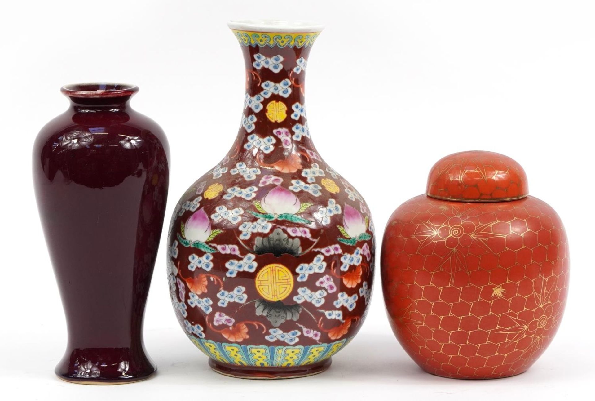 Chinese porcelain ginger jar and two vases including one with sang de boeuf glaze, the largest