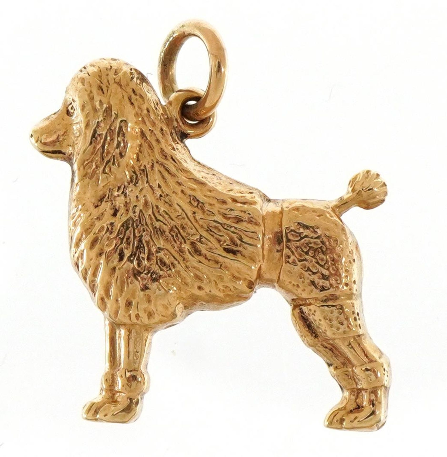 Unmarked gold poodle charm, 1.8cm high, 0.9g